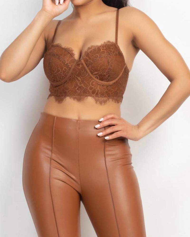 Front of a model wearing a size Large Hook-And-Eye Floral Lace Bralette Top in Brown in Brown by Haute Monde. | dia_product_style_image_id:334661